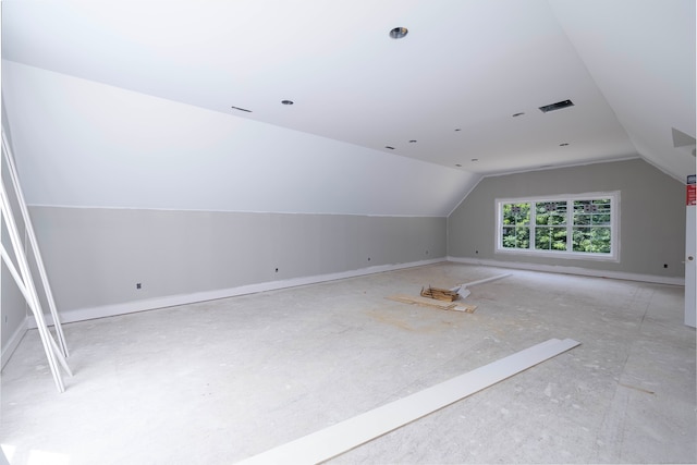 bonus room with vaulted ceiling