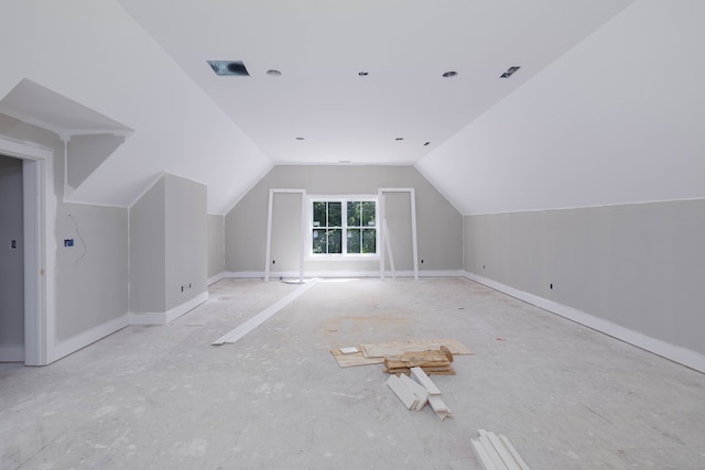 bonus room with vaulted ceiling