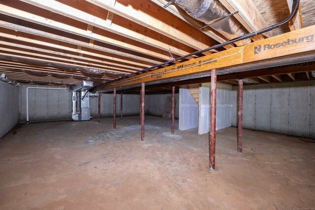 basement with heating unit