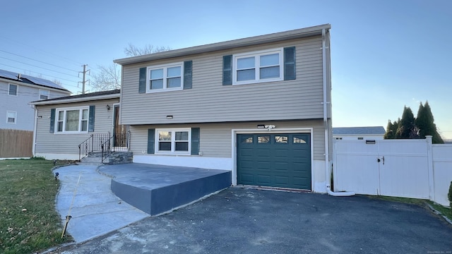 split level home with a garage