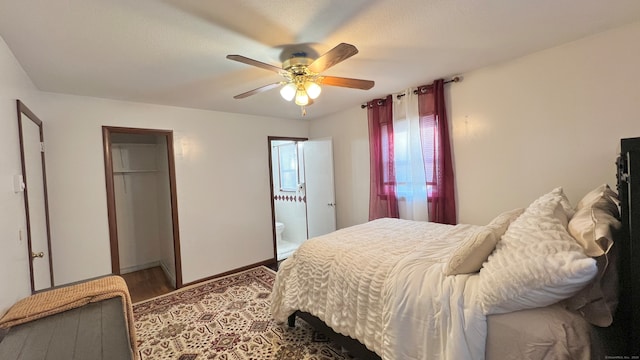 bedroom with ceiling fan and hardwood / wood-style flooring