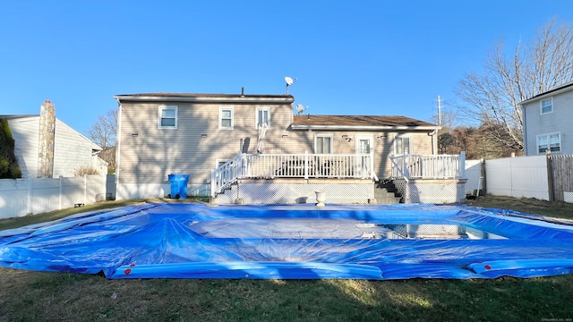 view of swimming pool featuring a deck