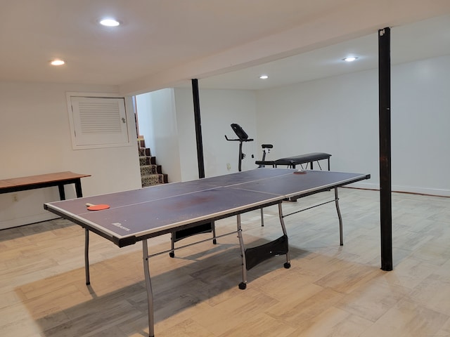 playroom with light hardwood / wood-style floors