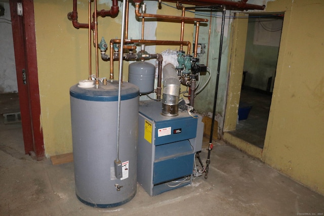 utility room with water heater