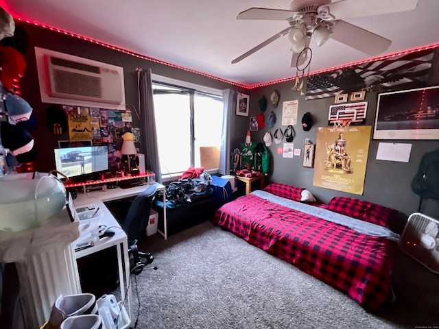 bedroom featuring a wall mounted AC, carpet, and ceiling fan