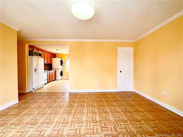 unfurnished living room with light parquet flooring and ornamental molding