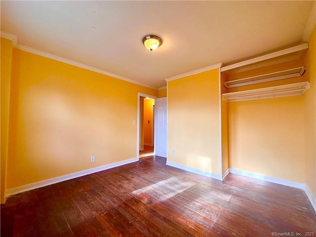 unfurnished bedroom with hardwood / wood-style flooring, a closet, and ornamental molding