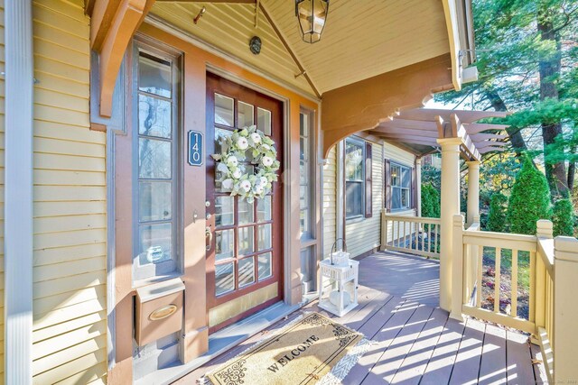 property entrance with covered porch