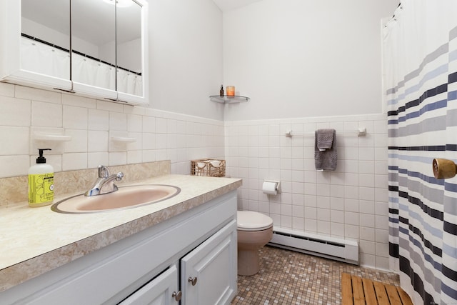 bathroom with tile patterned flooring, a baseboard heating unit, toilet, and tile walls