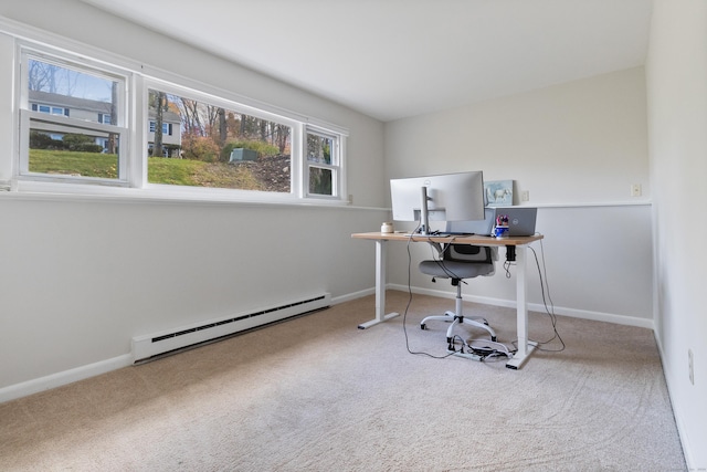 office space with carpet floors and baseboard heating