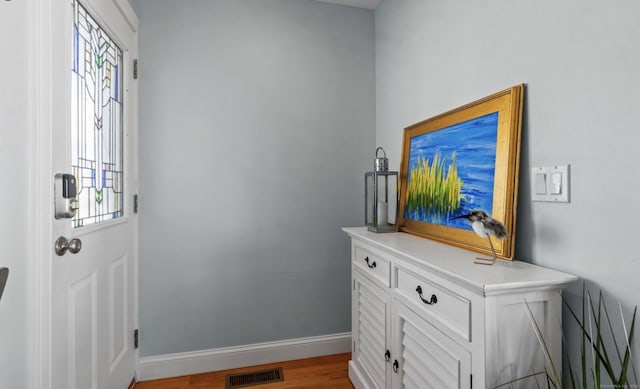442 Seaside Ave, Westbrook, CT 06498 - foyer featuring healthy amount of natural light, baseboards, and wood finished floors