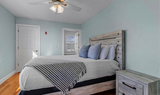 bedroom featuring ceiling fan and wood-type flooring