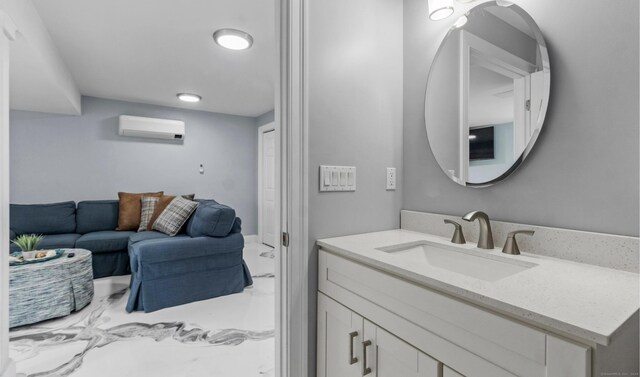 442 Seaside Ave, Westbrook, CT 06498 - bathroom featuring a wall mounted air conditioner, marble finish flooring, and vanity