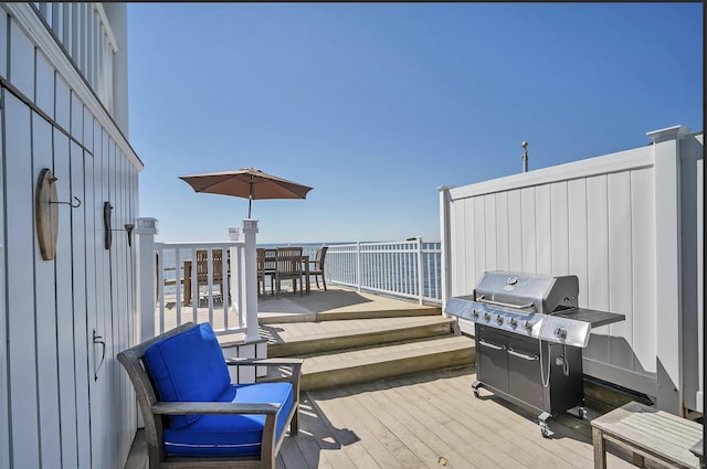 442 Seaside Ave, Westbrook, CT 06498 - deck featuring a grill, a water view, and outdoor dining area
