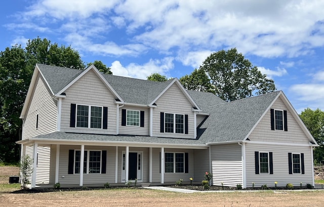 15 Melrose Dr Lot 4, Cheshire, CT 06410 - view of front of property featuring roof with shingles, a porch, and central AC