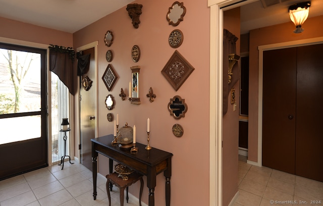 entryway featuring light tile patterned flooring