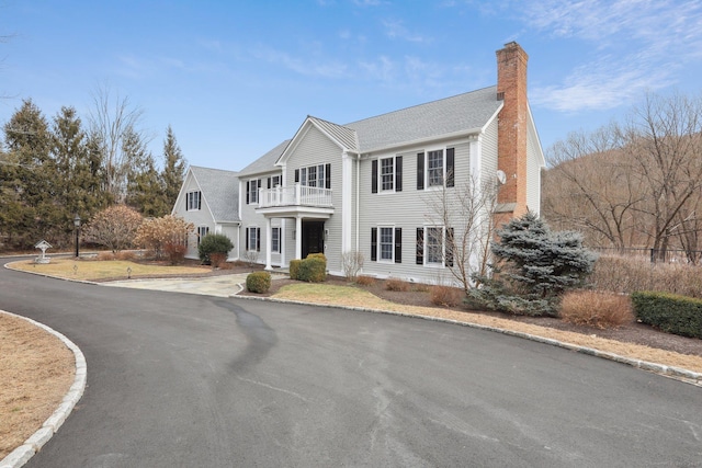 view of front of home with a balcony