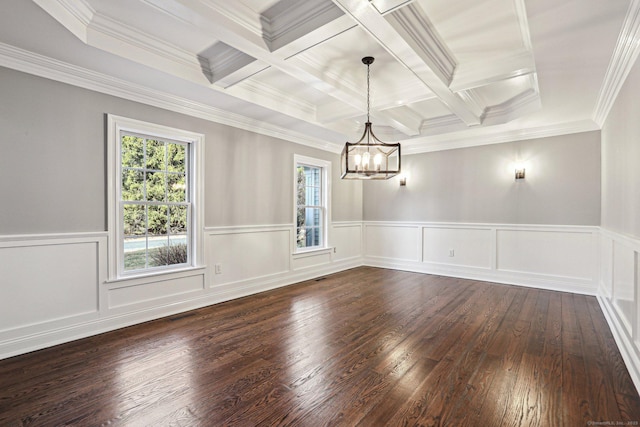 unfurnished dining area featuring dark hardwood / wood-style floors, beam ceiling, an inviting chandelier, crown molding, and coffered ceiling