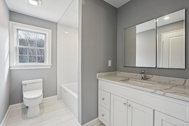 full bathroom with tile patterned floors, toilet, vanity, and shower / tub combination