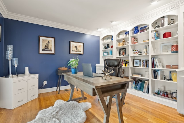 office area featuring ornamental molding and light hardwood / wood-style floors