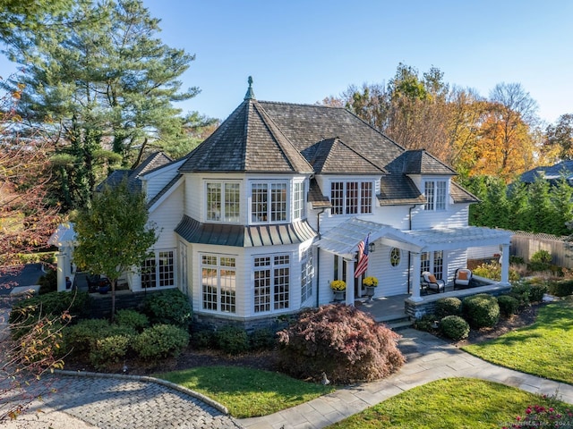 view of front of house featuring a pergola