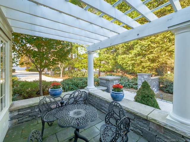 view of patio featuring a pergola