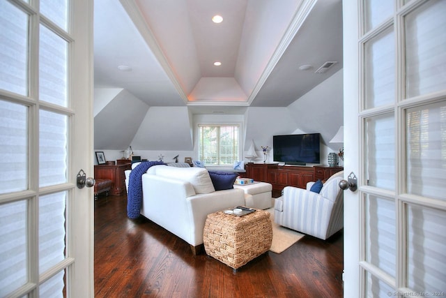 living room featuring french doors, dark hardwood / wood-style flooring, and vaulted ceiling