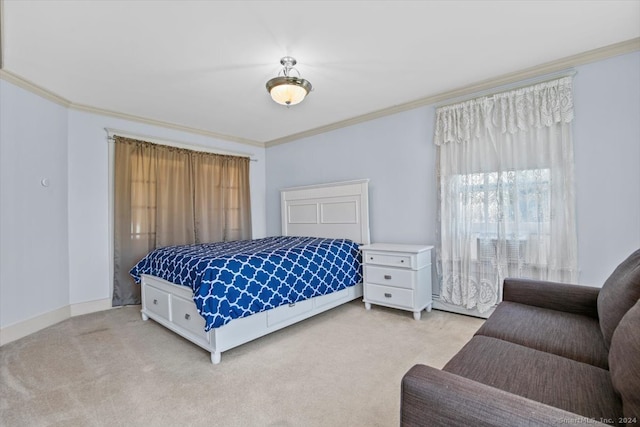 carpeted bedroom featuring ornamental molding