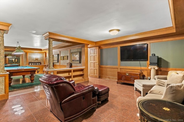 living room featuring pool table, ornate columns, and crown molding