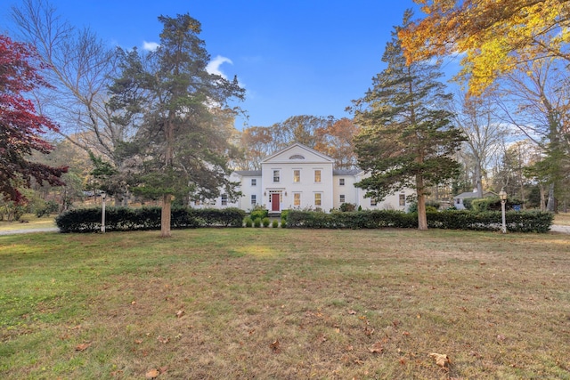 neoclassical / greek revival house with a front yard