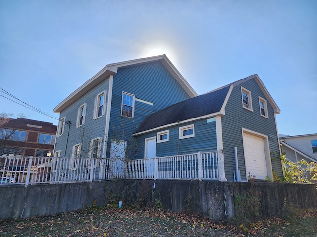 view of side of property featuring a garage