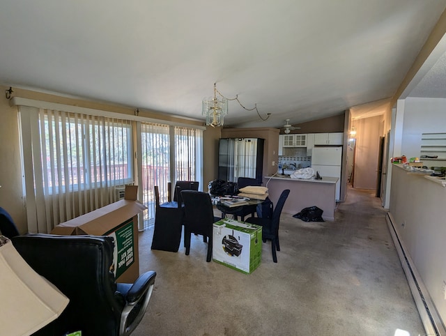 dining room with light carpet, vaulted ceiling, baseboard heating, and ceiling fan with notable chandelier