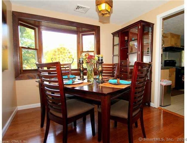 dining room featuring wood-type flooring