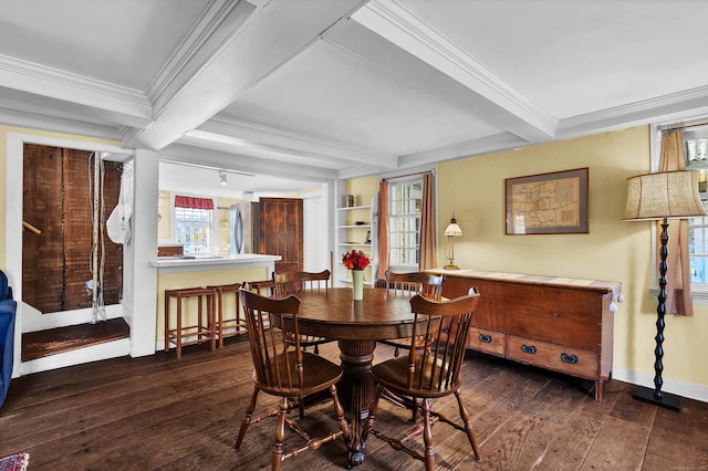 dining space featuring beam ceiling, crown molding, and dark hardwood / wood-style flooring