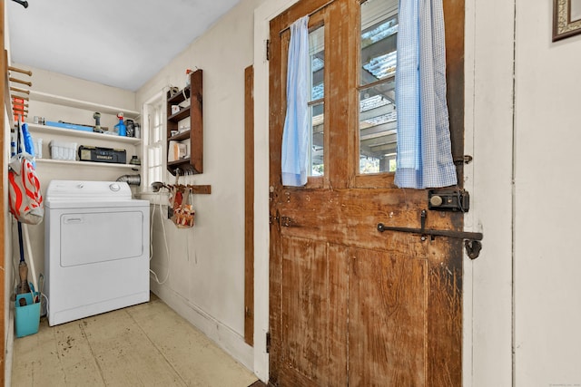 clothes washing area featuring washer / clothes dryer