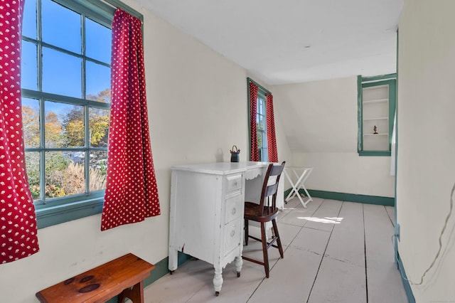 dining area with lofted ceiling