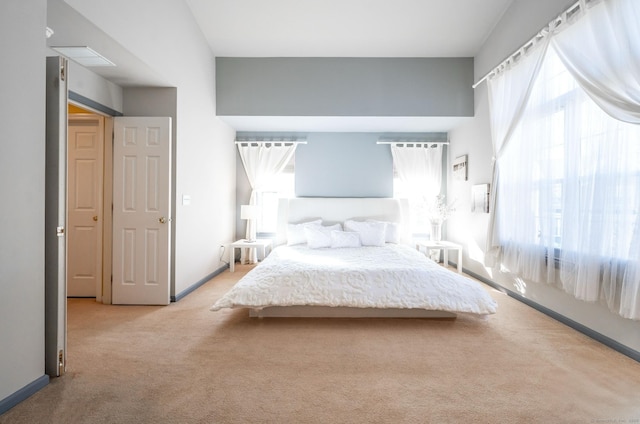 unfurnished bedroom with baseboards and carpet floors