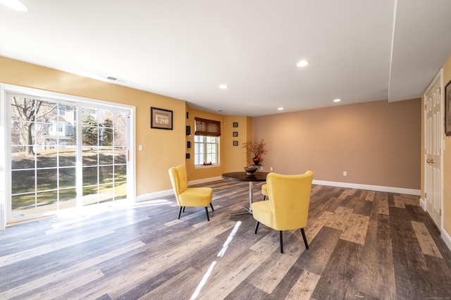 sitting room with visible vents, recessed lighting, wood finished floors, and baseboards