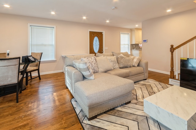 living room with light hardwood / wood-style flooring