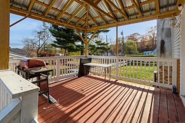 deck featuring a lawn and a gazebo