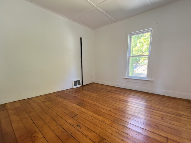 unfurnished room featuring wood-type flooring