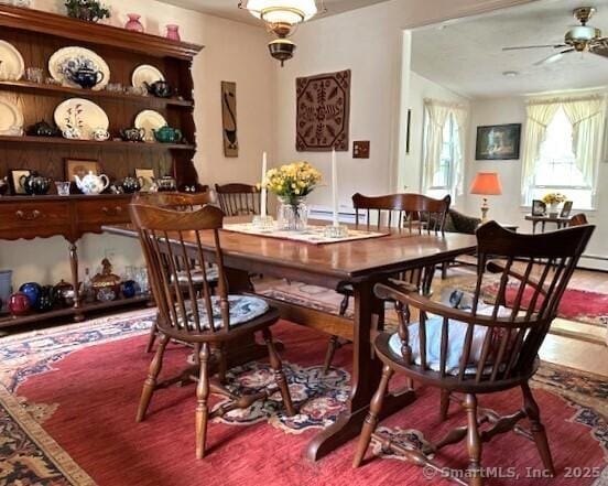 dining space with ceiling fan