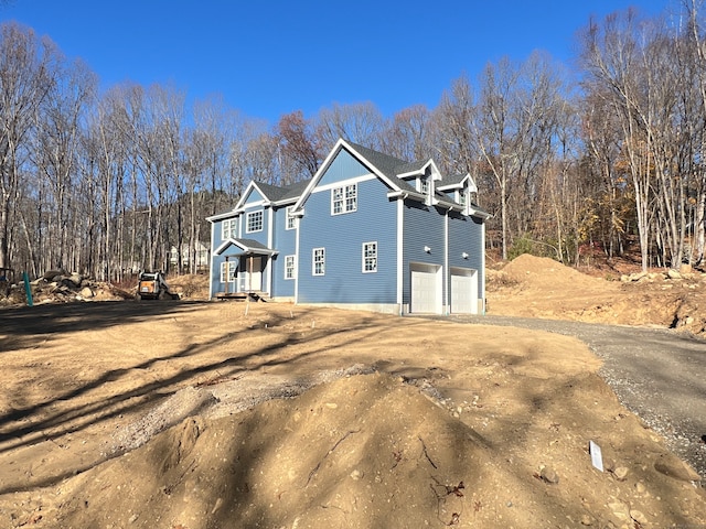 view of home's exterior with a garage