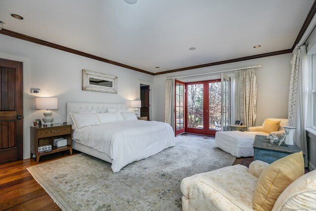 bedroom with access to exterior, french doors, dark hardwood / wood-style flooring, and ornamental molding