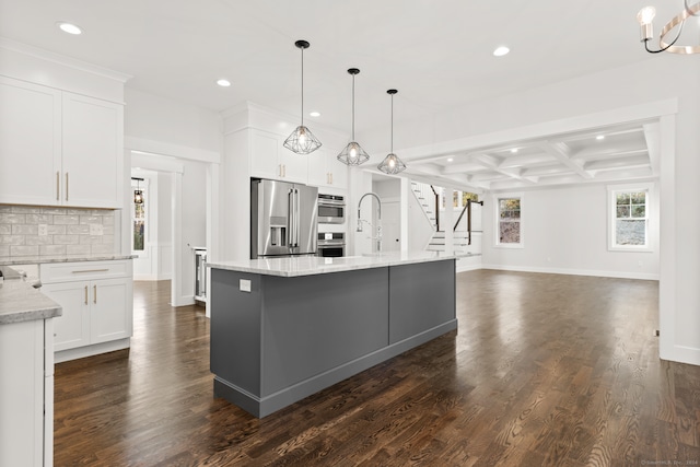 kitchen featuring a spacious island, dark wood-type flooring, white cabinets, and high end fridge