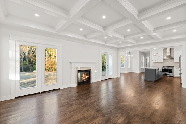 15 Parsons Way, Avon, CT 06001 - unfurnished living room with a chandelier, coffered ceiling, a glass covered fireplace, recessed lighting, and dark wood-style flooring