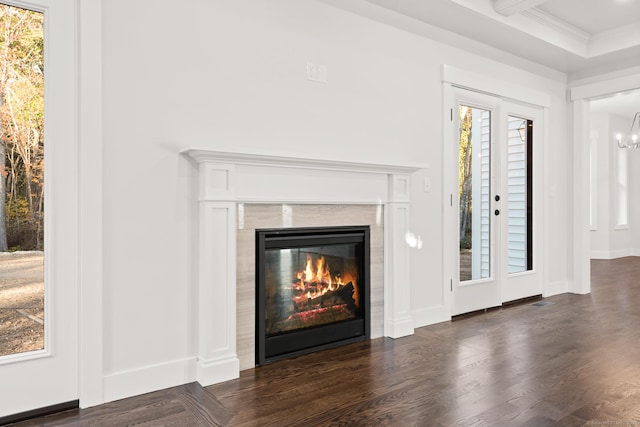 15 Parsons Way, Avon, CT 06001 - unfurnished living room featuring a premium fireplace, dark wood-style flooring, a chandelier, and ornamental molding