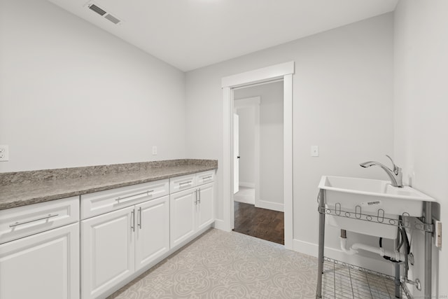 bathroom featuring hardwood / wood-style flooring