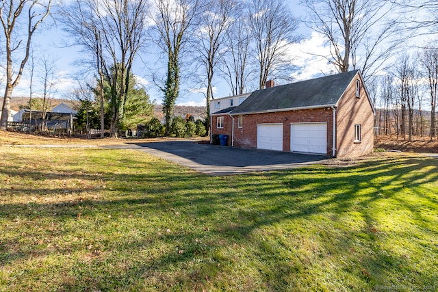 garage with a lawn