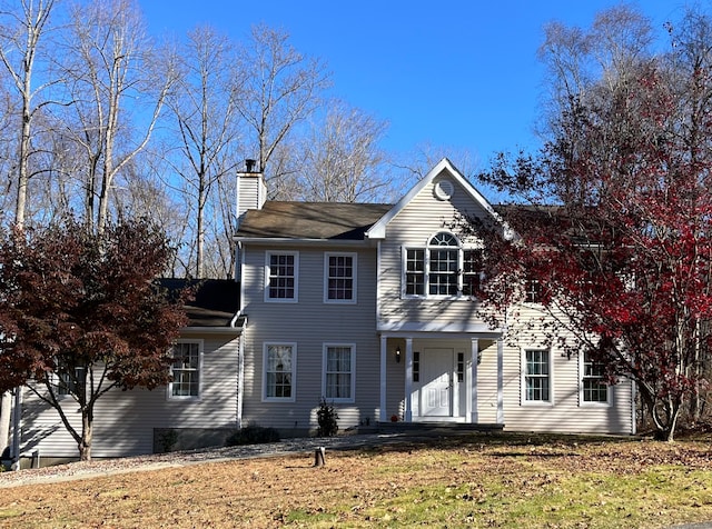 colonial house with a front lawn